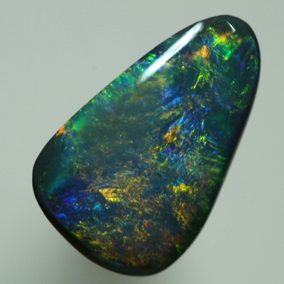 SOLID BLACK OPAL Bright golden fire moves to and fro